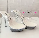 Zapatillas transparentes con plataforma, tacón alto y hebilla en el tobillo